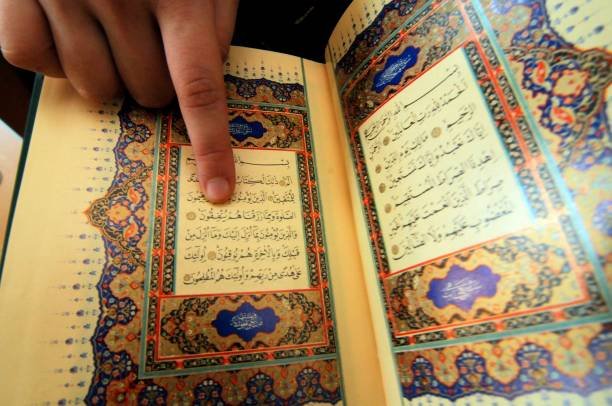 Quran or Koran, religious text of Islam, believed by Muslims